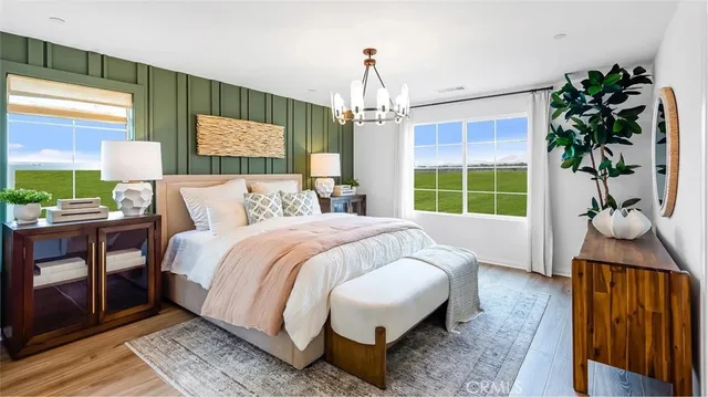 a bed room with a bed and a window