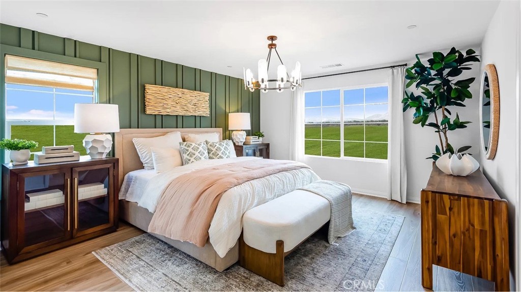 1678 Phantom Lane Rialto, CA 92376 - Photo 10 of 18 a bed room with a bed and a window