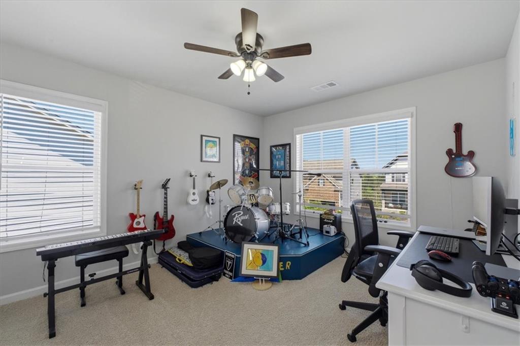 621 Little Bear Loop Canton, GA 30114 - Photo 26 of 45 a room with furniture and a window
