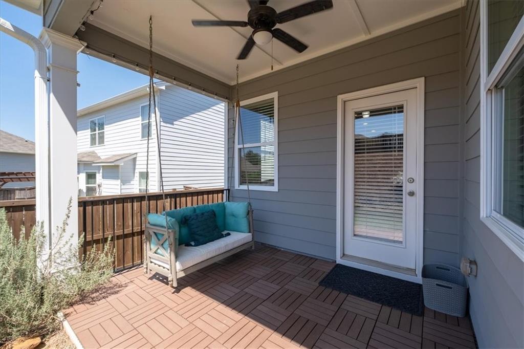 621 Little Bear Loop Canton, GA 30114 - Photo 37 of 45 a view of a porch with wooden floor and a yard