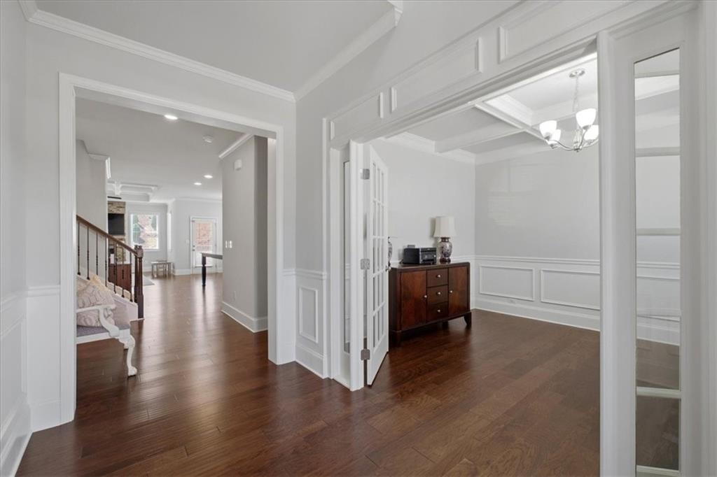 621 Little Bear Loop Canton, GA 30114 - Photo 6 of 45 a view of a hallway view with wooden floor and furniture