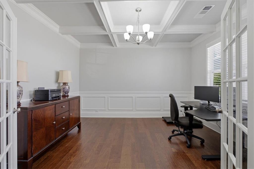 621 Little Bear Loop Canton, GA 30114 - Photo 7 of 45 a view of a workspace with furniture and a window