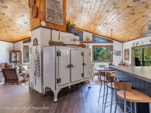 a view of a chairs and table in a patio