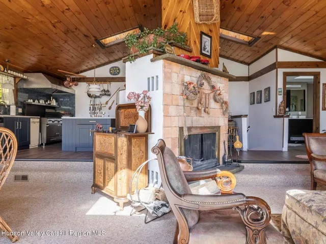 a view of a chairs and table in a patio