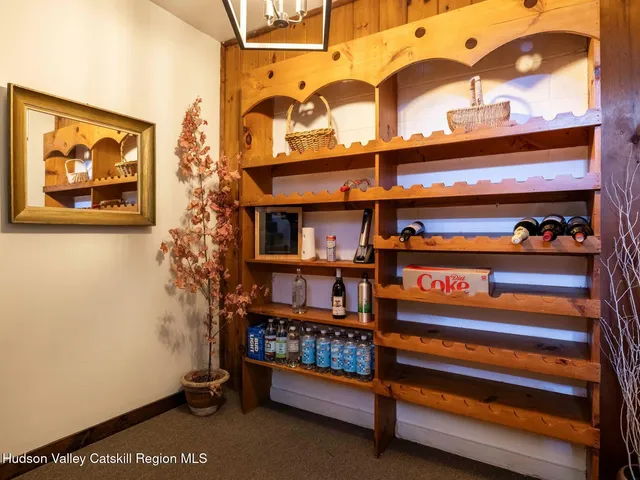 a view of a room with racks on the wall