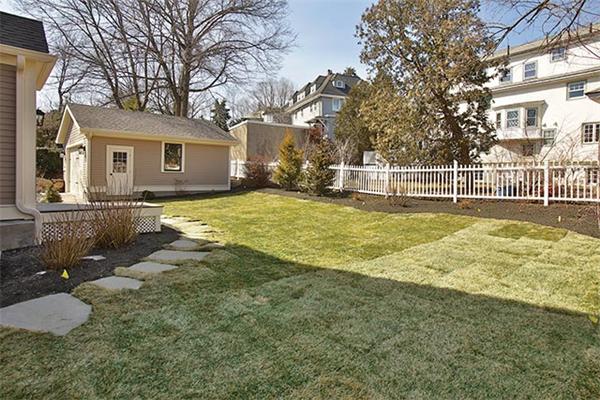 77 Salisbury Road Brookline, MA 02445 - Photo 11 of 11 a view of a house with a yard