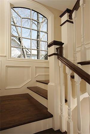 77 Salisbury Road Brookline, MA 02445 - Photo 8 of 11 a view of staircase with white walls and a window