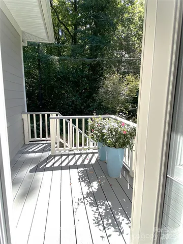 a view of a balcony with chair