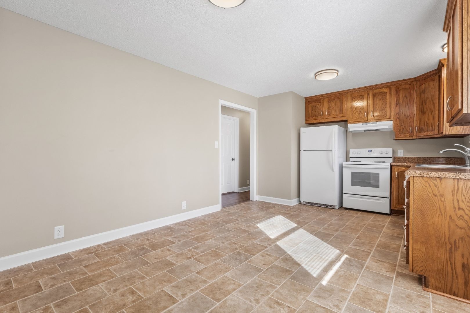 118 Union Hall Road Clarksville, TN 37040 - Photo 11 of 26 a view of a kitchen with a sink cabinets and a window