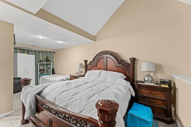 a bedroom with a bed and a closet