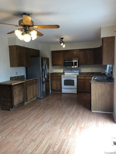 800 Leon Road Walled Lake, MI 48390 - Photo 2 of 9 IMG_1378.jpg