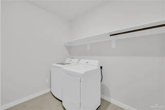 a kitchen with refrigerator and stove