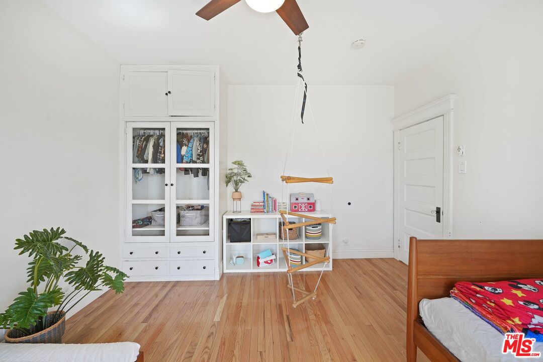 5159 Meridian Street Los Angeles, CA 90042 - Photo 17 of 41 a room with furniture and wooden floor