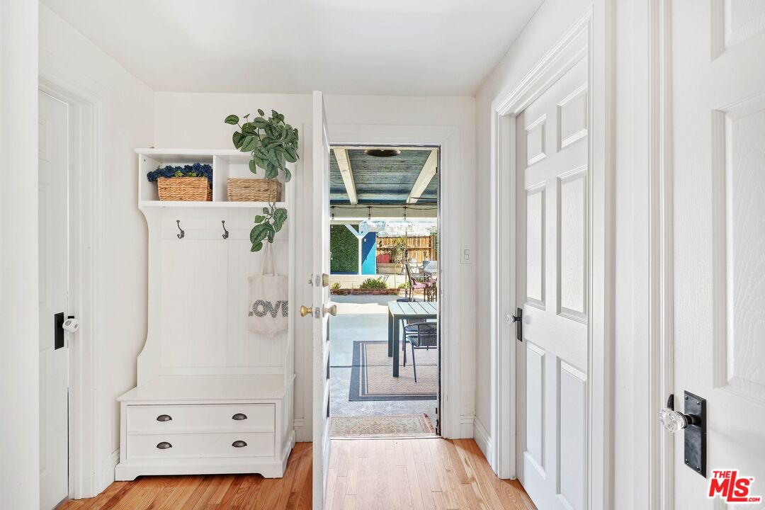 5159 Meridian Street Los Angeles, CA 90042 - Photo 22 of 41 a view of a bedroom with baby crib and hallway