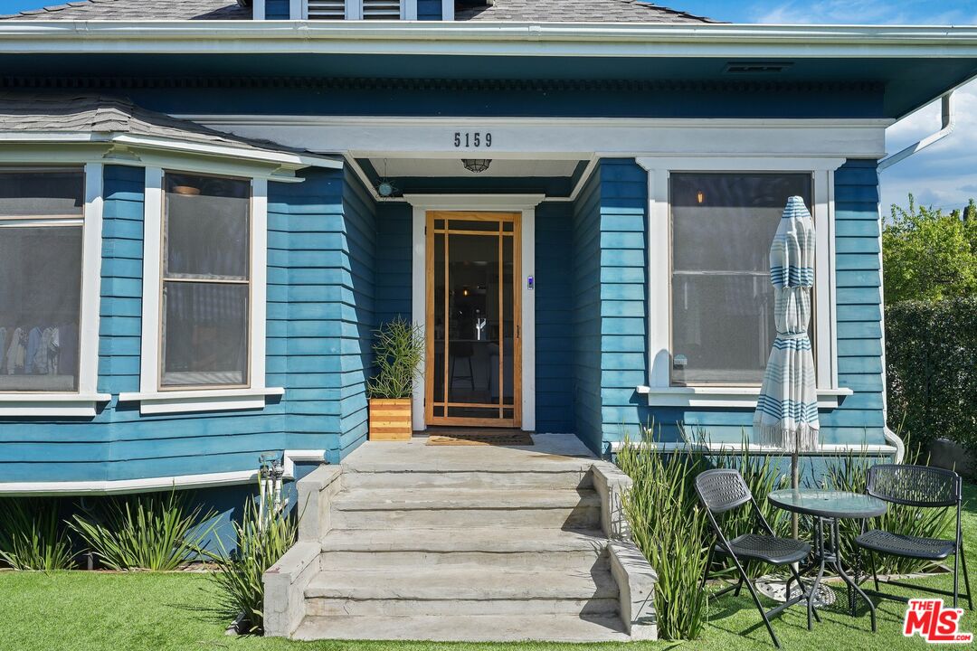 5159 Meridian Street Los Angeles, CA 90042 - Photo 3 of 41 a front view of a house with garden