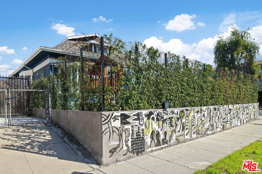 5159 Meridian Street Los Angeles, CA 90042 - Photo 38 of 41 a view of a street with a trees in the background