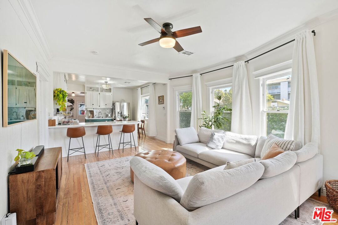 5159 Meridian Street Los Angeles, CA 90042 - Photo 5 of 41 a living room with furniture and a large window