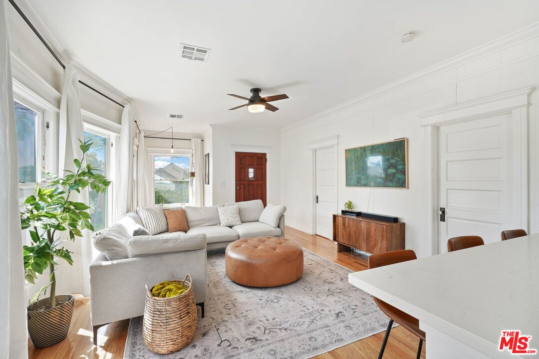 5159 Meridian Street Los Angeles, CA 90042 - Photo 7 of 41 a living room with furniture and a flat screen tv