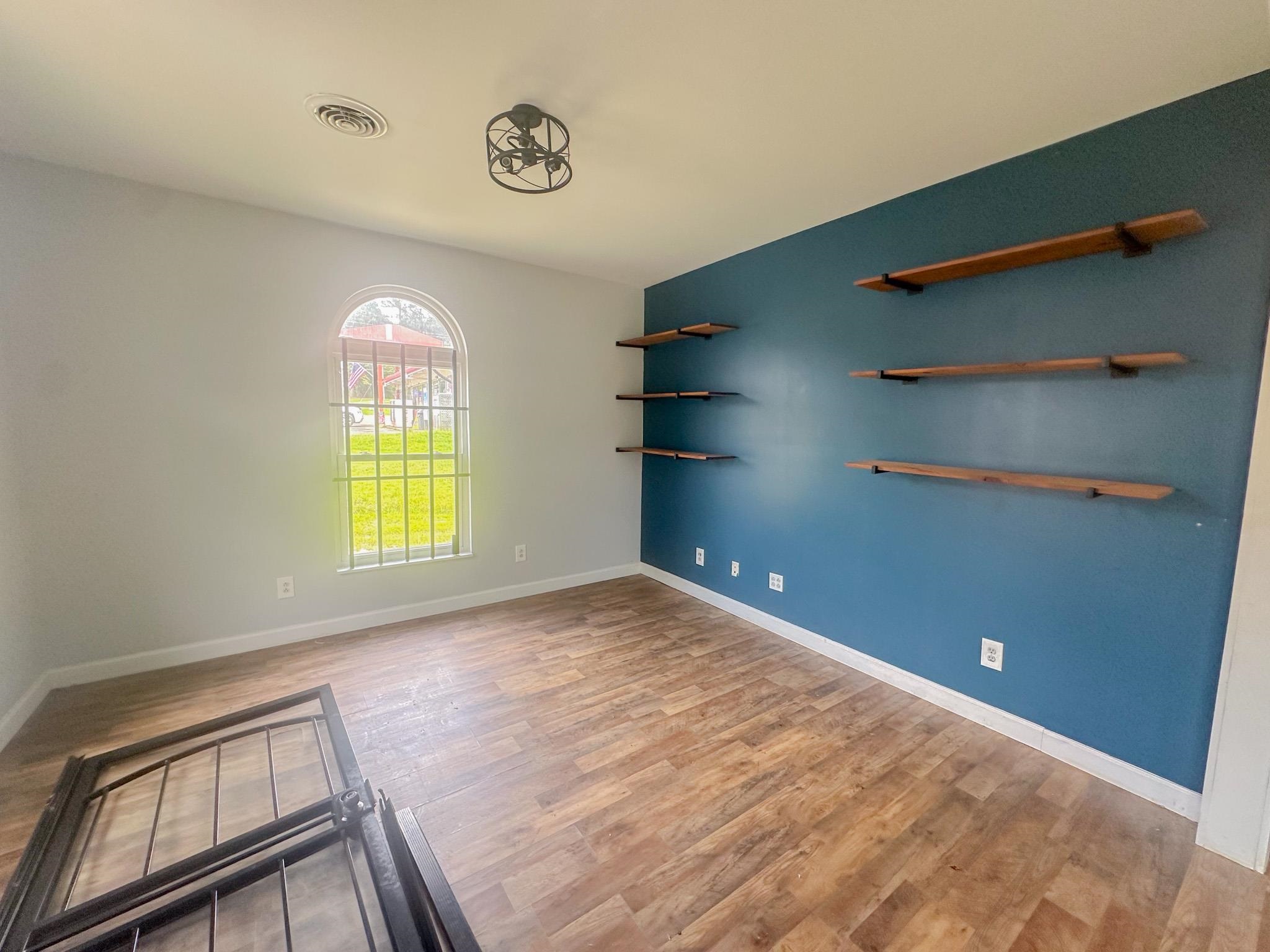 800 East Quitman Street Iuka, MS 38852 - Photo 4 of 7 a view of an empty room with a window