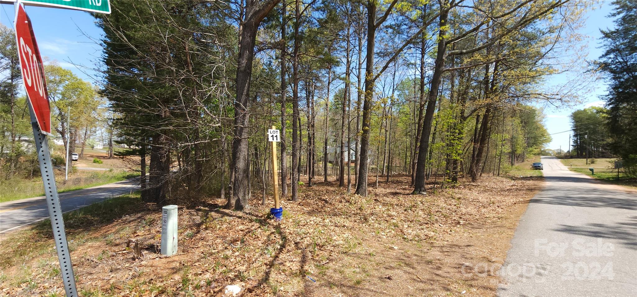 Lot 11 Cannon Road, Unit 11 Inman, SC 29349 - Photo 8 of 14 a backyard of a house with lots of trees