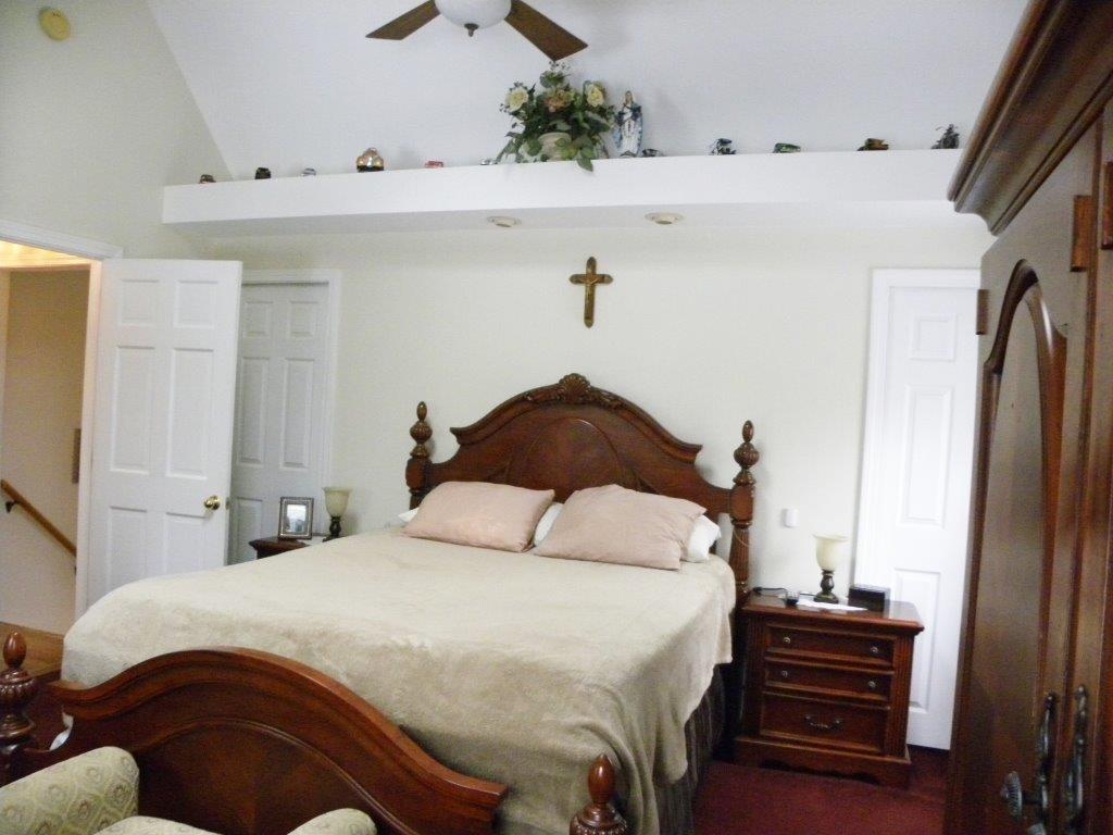 107 Pheasant Run Road Waterboro, ME 04030 - Photo 19 of 26 Master bedroom with vaulted...