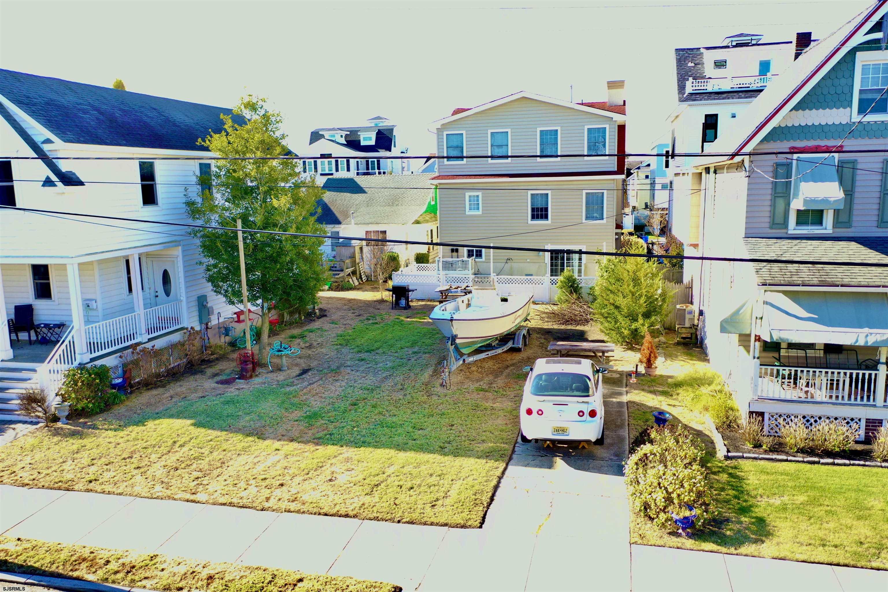 68 West 15th Street Ocean City, NJ 08226 - Photo 2 of 4 a aerial view of a house with a yard