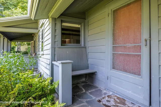 a backyard of a house with seating space