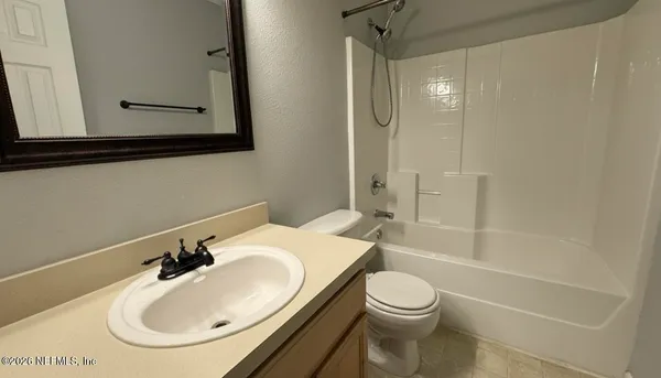 a utility room with washer and dryer
