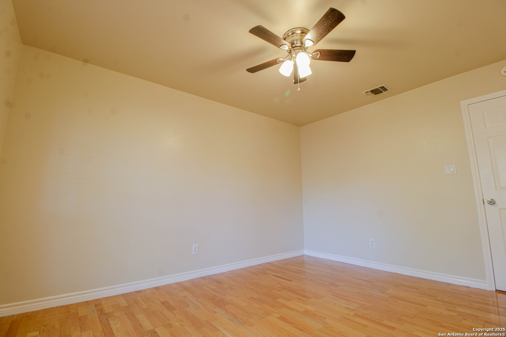 6703 Ridge Pl Street San Antonio, TX 78250 - Photo 36 of 44 wooden floor in a empty room