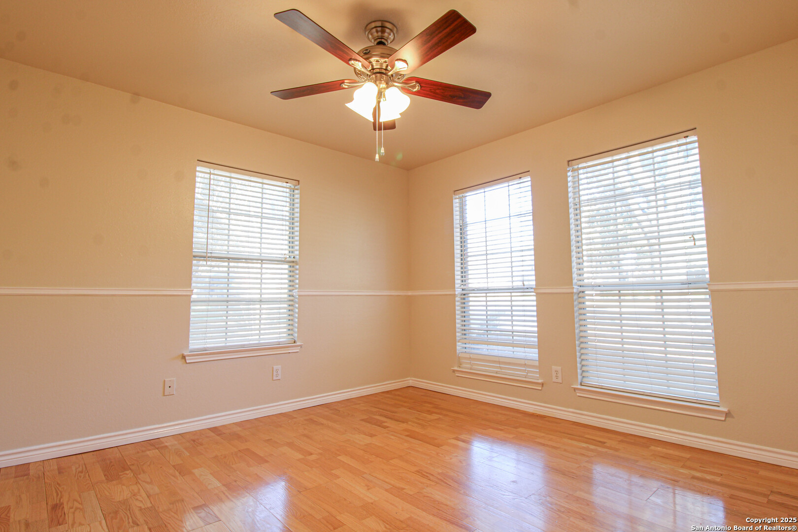 6703 Ridge Pl Street San Antonio, TX 78250 - Photo 5 of 44 a view of an empty room with a window
