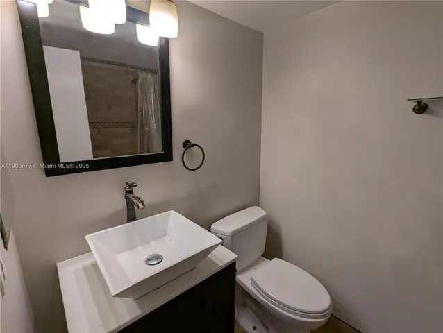 a bathroom with a shower and a bathtub