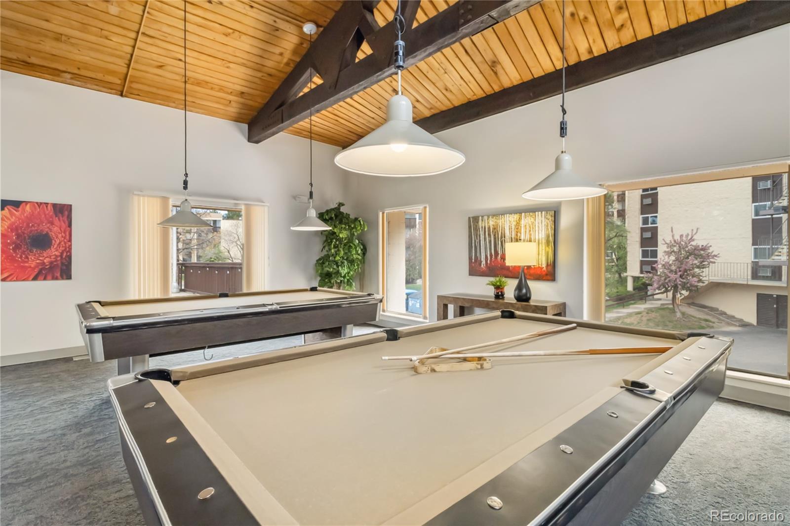 7040 East Girard Avenue, Unit E406 Denver, CO 80224 - Photo 22 of 27 a room with pool table and windows