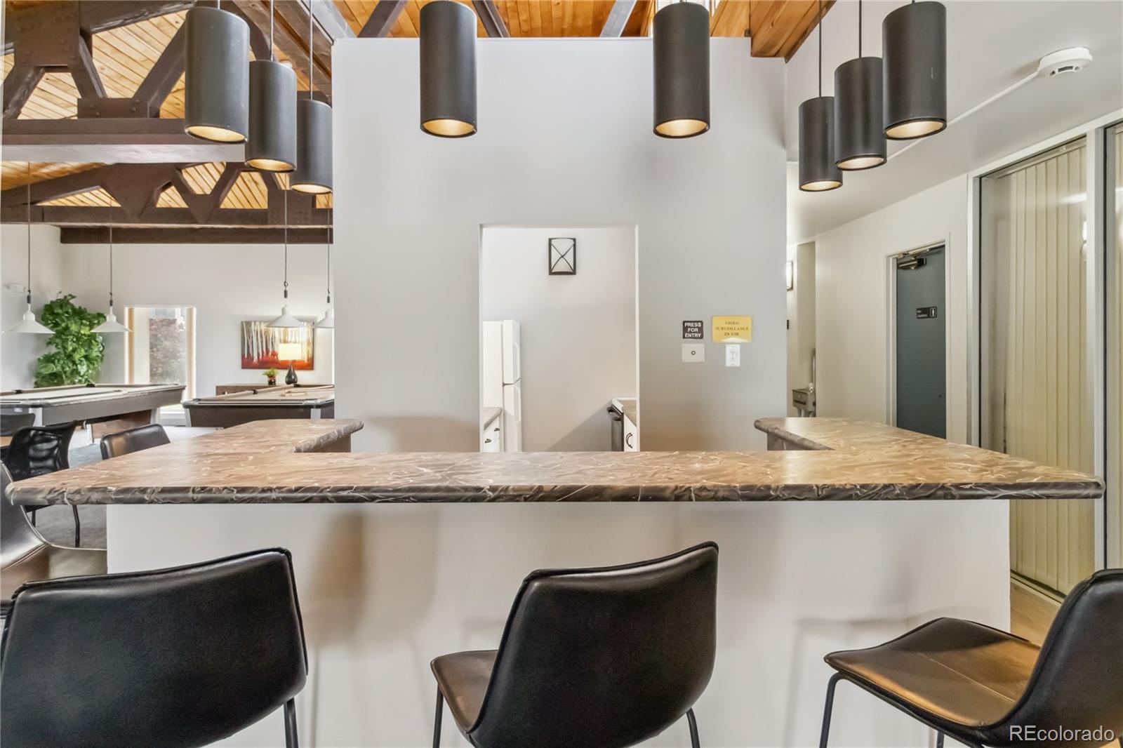 7040 East Girard Avenue, Unit E406 Denver, CO 80224 - Photo 24 of 27 a bathroom with a granite countertop sink and a mirror
