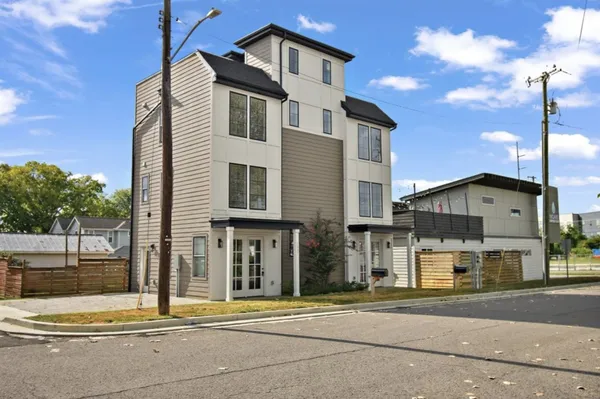 a view of a house with a street