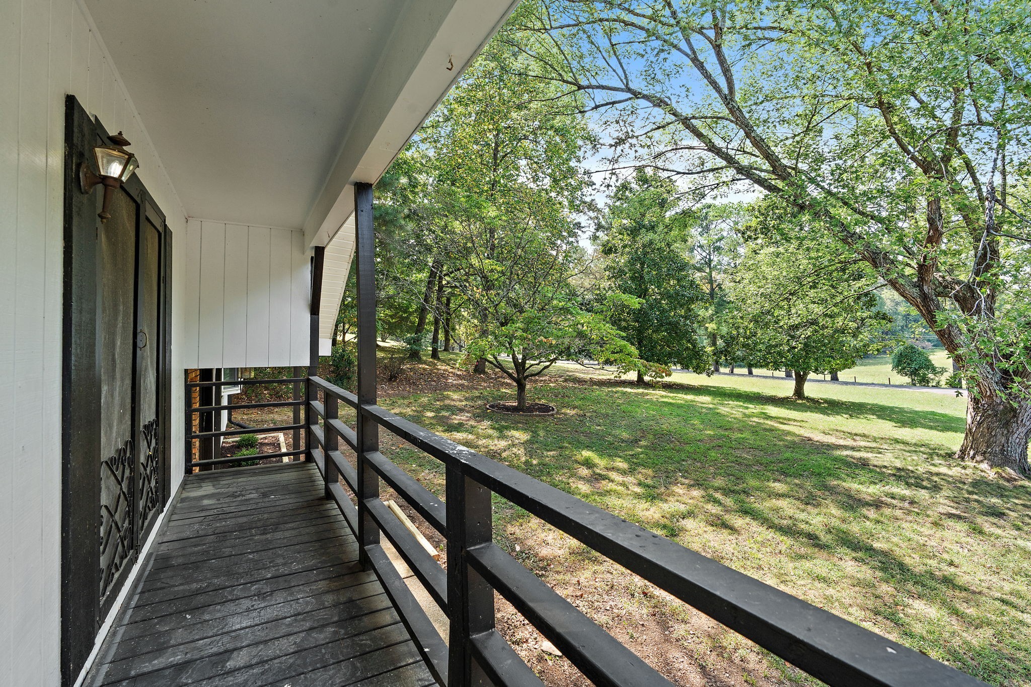 1627 West Grab Creek Road Dickson, TN 37055 - Photo 25 of 46 a view of a garden from a balcony