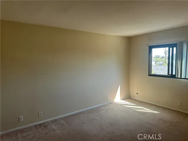 a bathroom with a bathtub and toilet