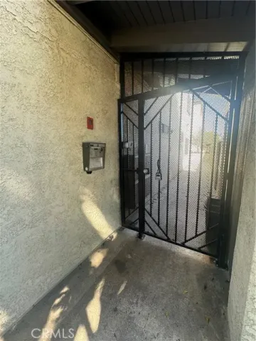 a view of a street with flower plants