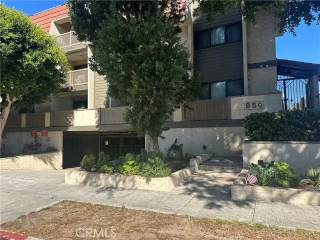 a view of balcony with deck and furniture