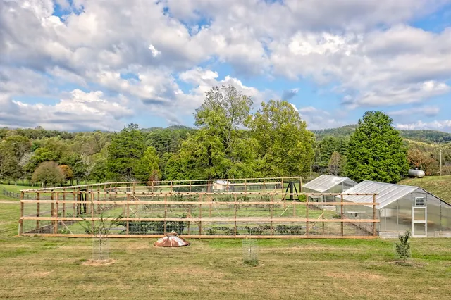 a view of a patio with couches table and chairs