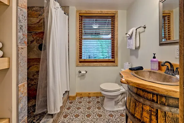 a view of a park with large trees