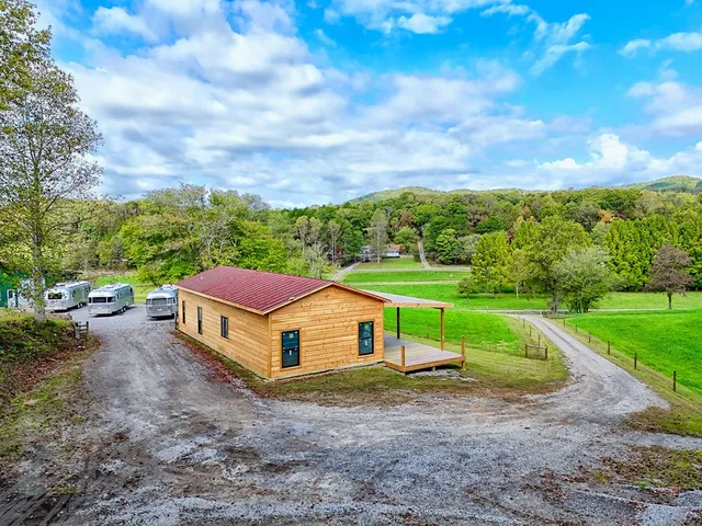 a view of a garden with an outdoor seating