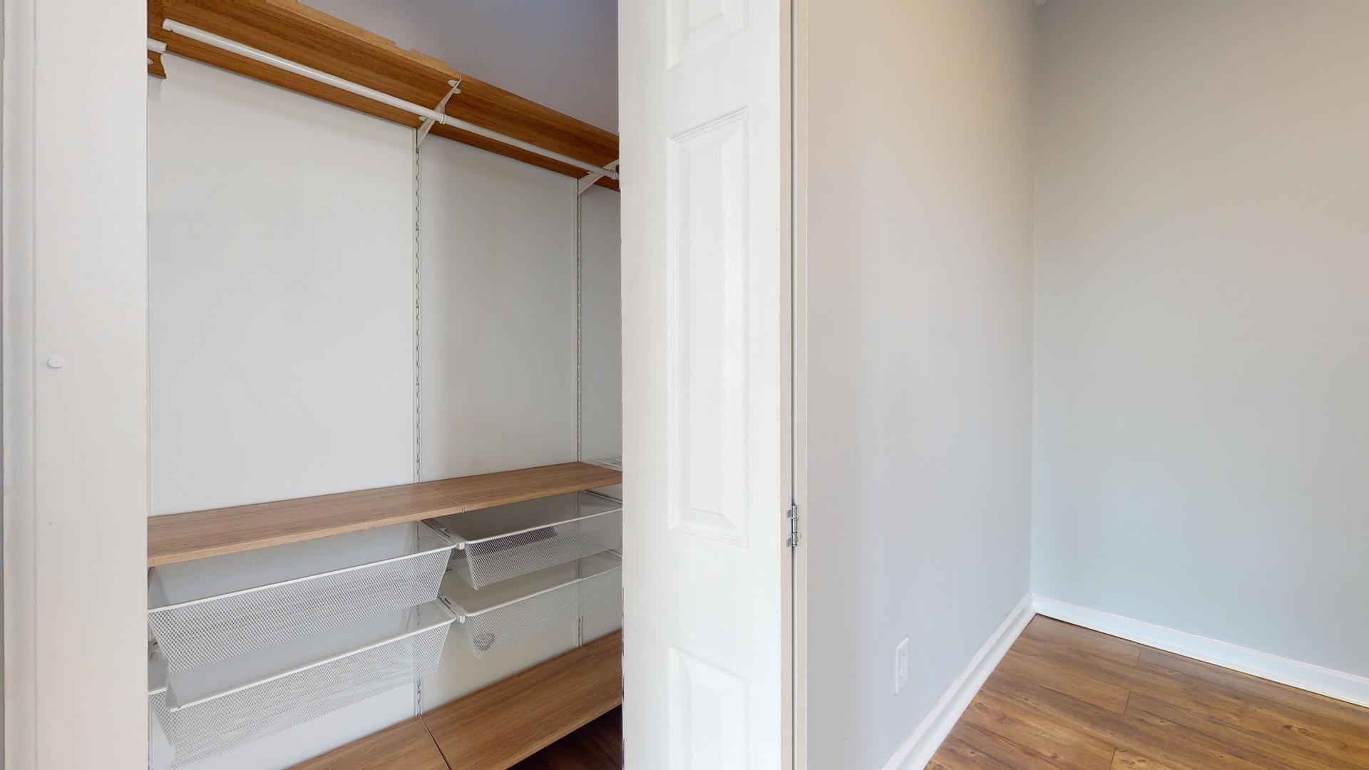 2700 West Cermak Road, Unit 2R Chicago, IL 60608 - Photo 12 of 15 a view of walk in closet with empty racks