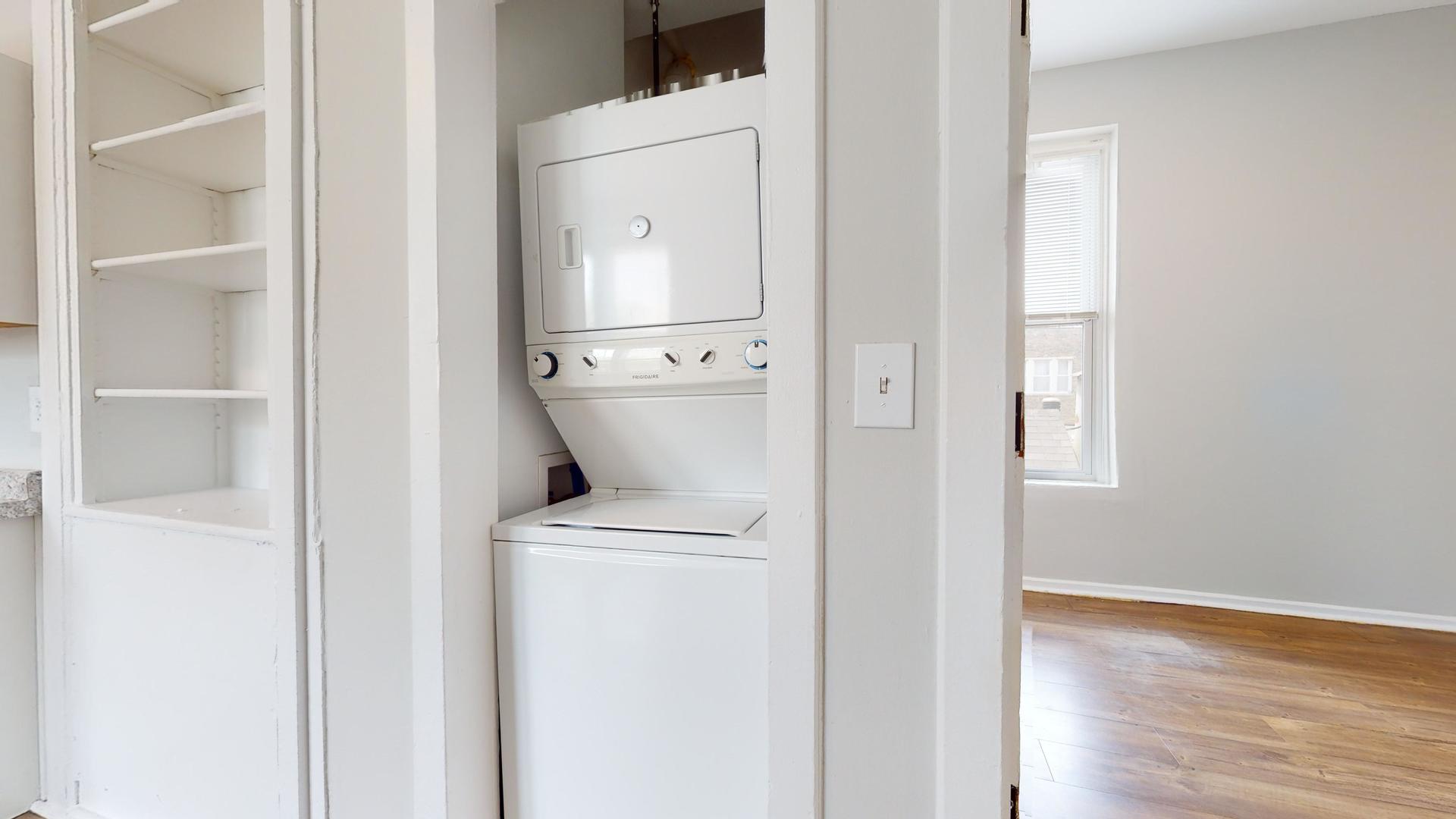 2700 West Cermak Road, Unit 2R Chicago, IL 60608 - Photo 8 of 15 a close view of a utility room with dryer and washer