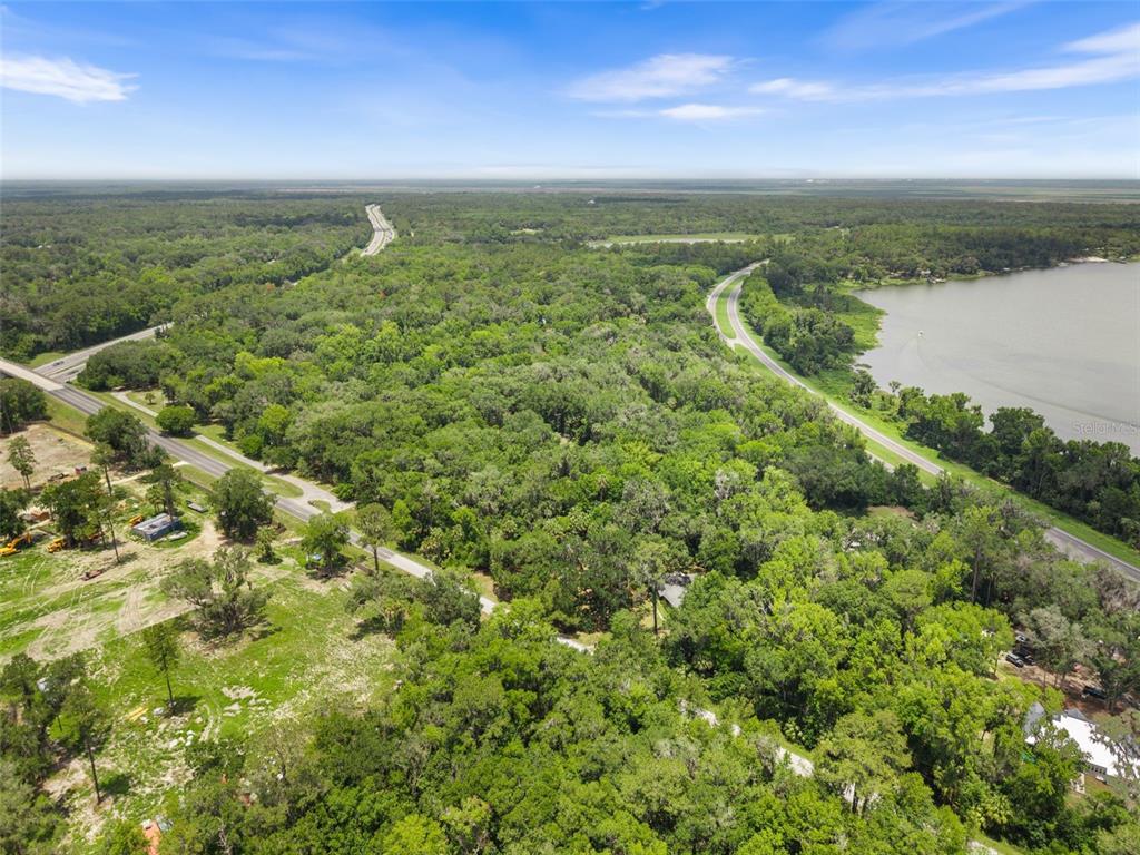 Tbd Southeast Wacahoota Road Micanopy, FL 32667 - Photo 8 of 13 a view of a lake with a city