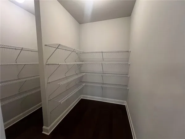 a view of storage and utility room with empty racks