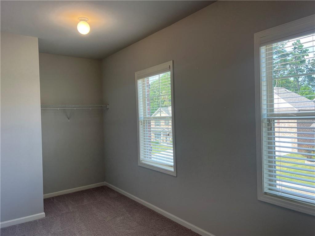 3434 IVY FARM Path Buford, GA 30519 - Photo 18 of 37 an empty room with a window
