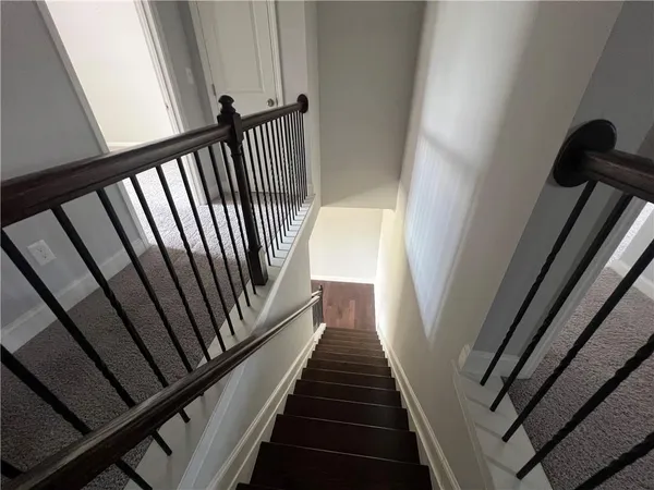 a view of a balcony with stairs