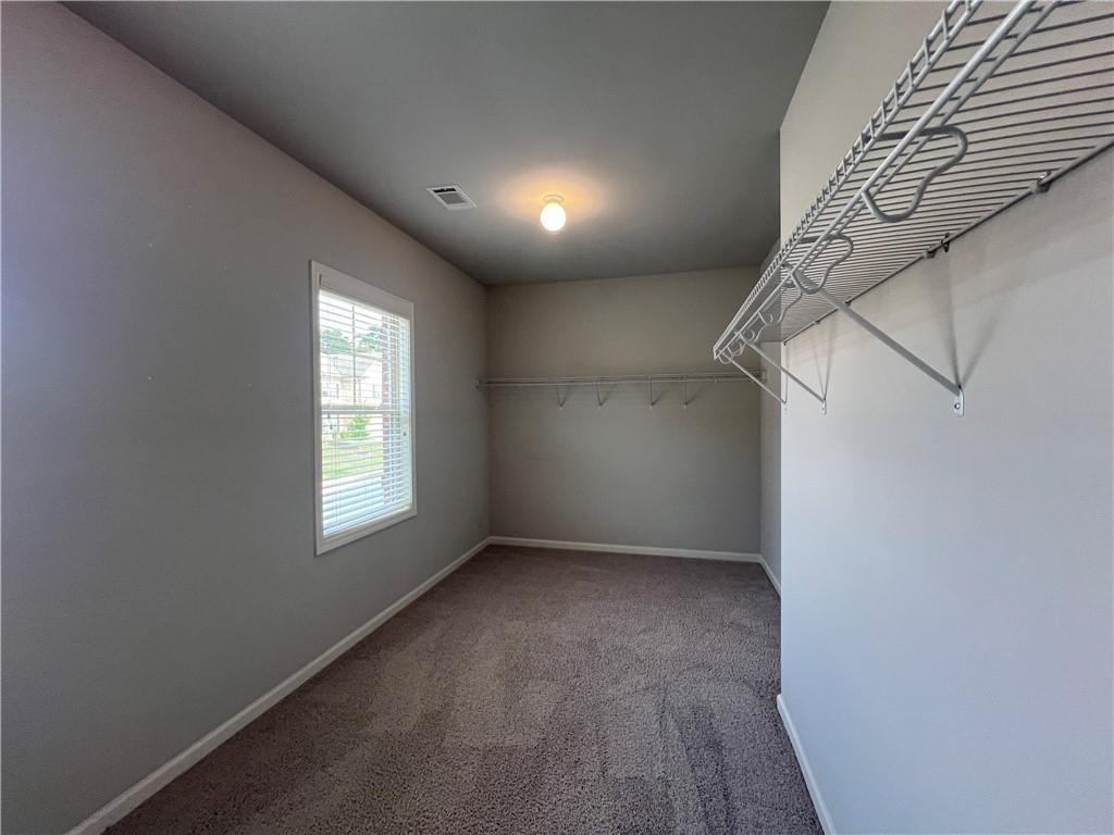 3434 IVY FARM Path Buford, GA 30519 - Photo 35 of 37 a view of an empty room with a window