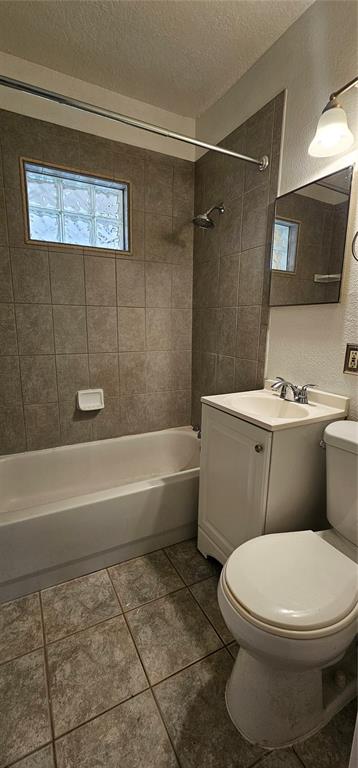 3125 19th Street North St. Petersburg, FL 33713 - Photo 12 of 14 a bathroom with a toilet a sink and bathtub