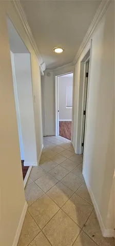 a view of entryway with window and door